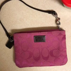 Pink classic Coach wristlet